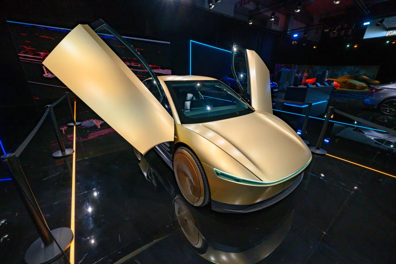 Tesla Cybercab on display with butterfly doors open